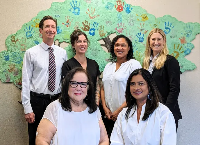 Chiropractor Oceanside CA Jason Higgins With Team